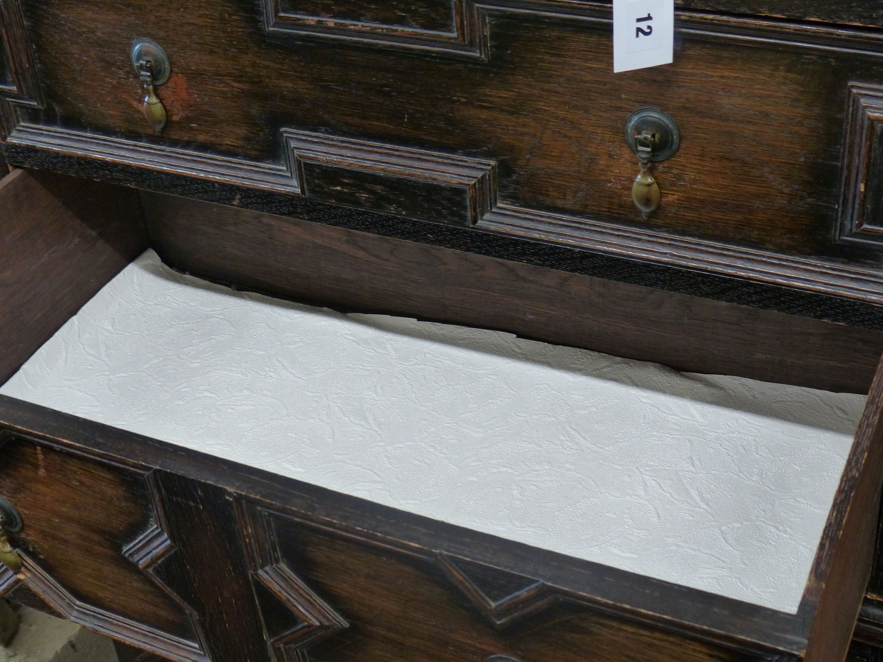 A 1920's narrow oak chest on chest, width 82cm depth 45cm height 167cm